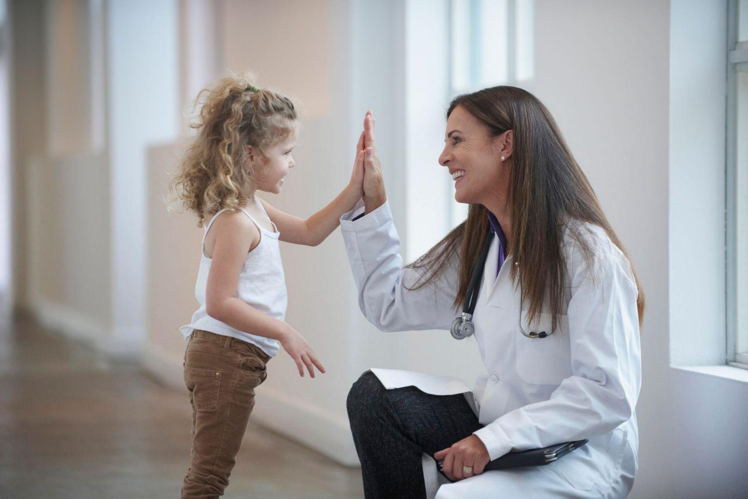 https://www.gettyimages.com/detail/photo/caucasian-doctor-and-girl-high-fiving-in-hallway-royalty-free-image/565977085?phrase=kids+care&adppopup=true